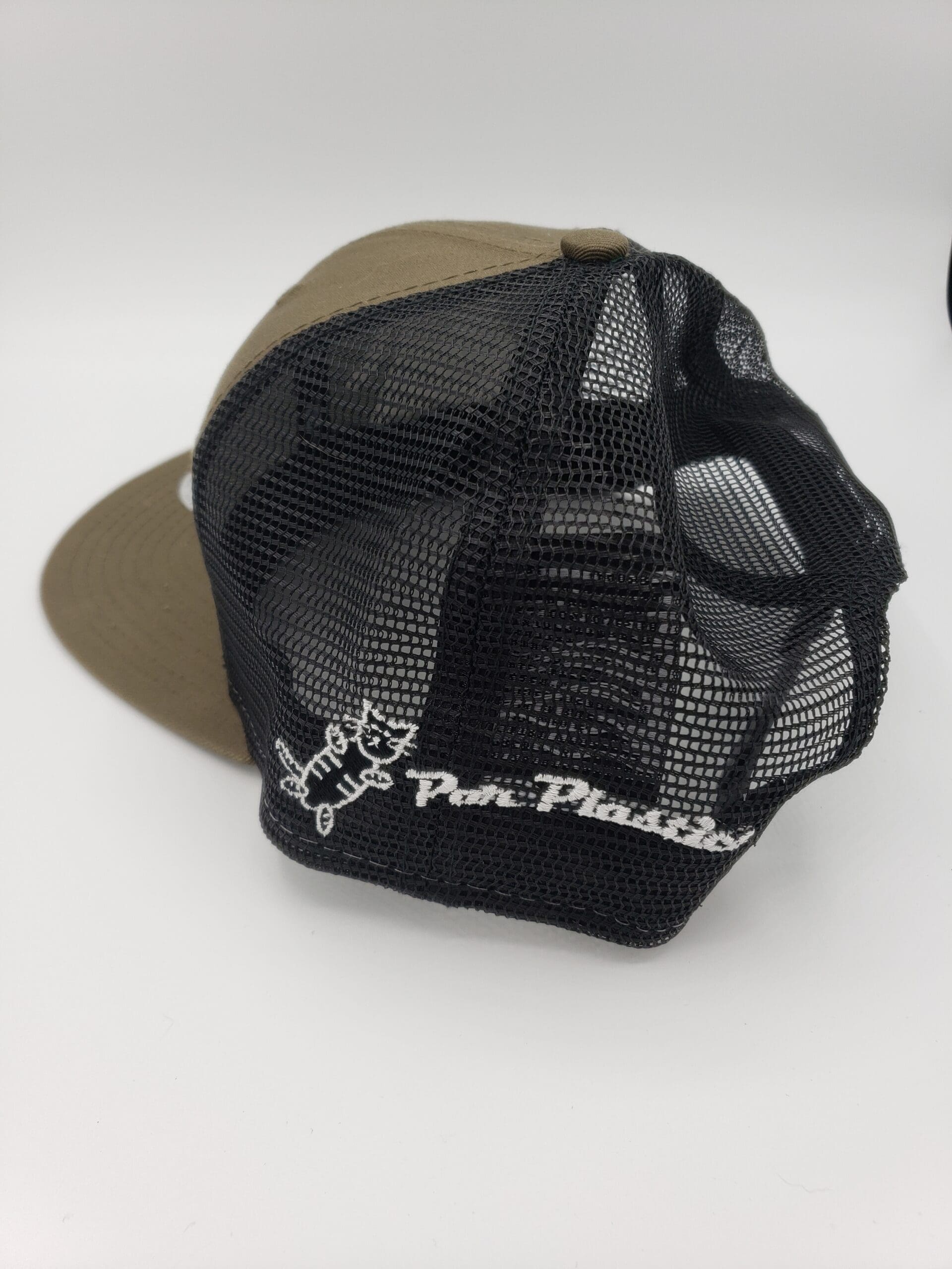 Par Plastics Snapback Trucker Cap disc golf disc side view